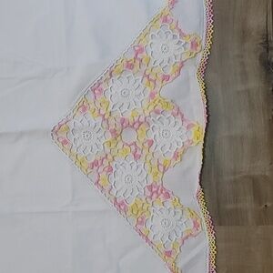 Vintage handmade white pillowcases with white yellow pink doilies tatting added
